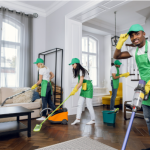 How to Start Up a Home Based Business Without Losing Your Mind Person starting a home cleaning business by cleaning a client's living room