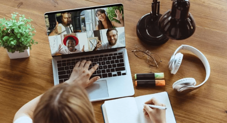Entrepreneur working on laptop while starting an online business from home